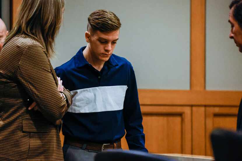 Adam Barney, 17, enters the courtroom at the Collin County Courthouse in McKinney on...