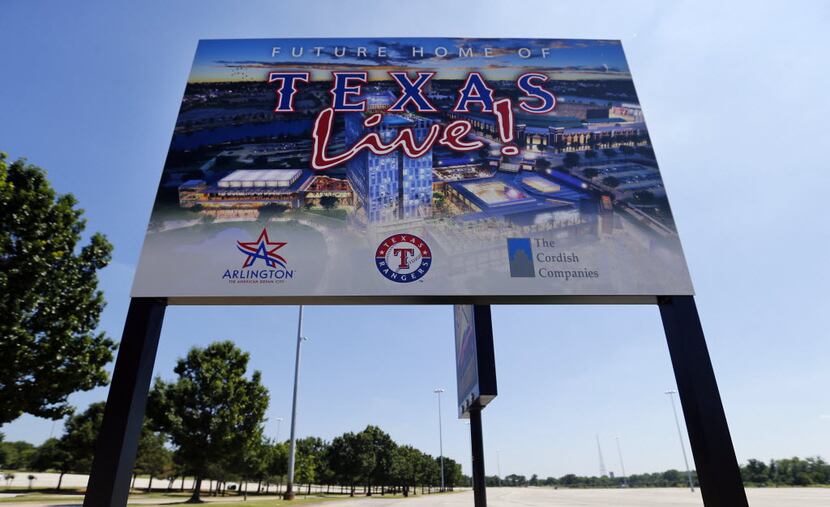A sign advertises where the new Texas Live! entertainment venue will be built across from...