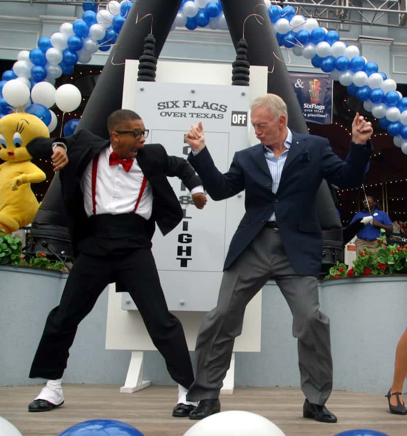 Dallas Cowboy's owner Jerry Jones, right, dances with Jason Johnson of the "It's Playtime...