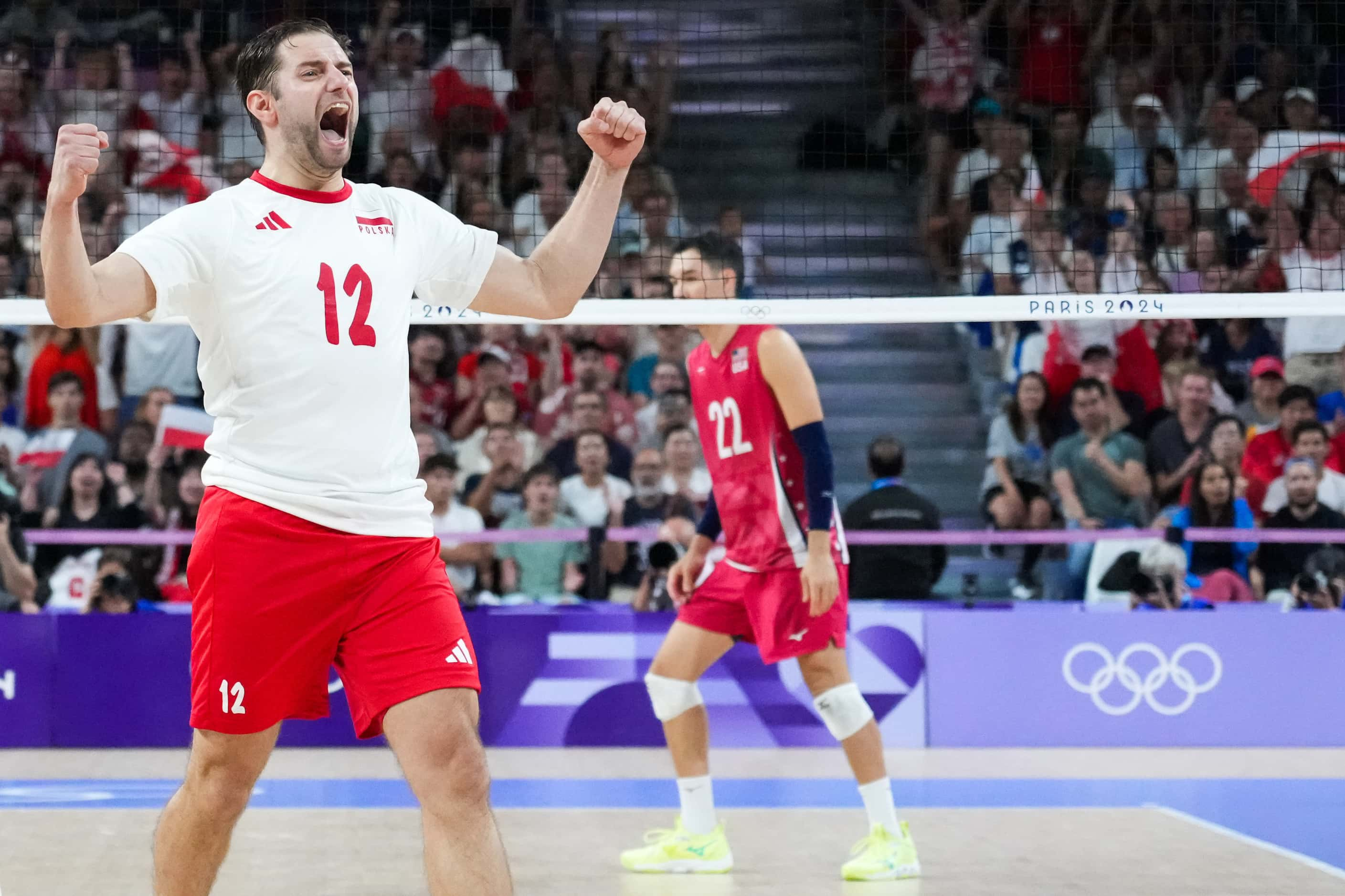 Grzegorz Lomacz of Poland celebrates after a point during a men’s volleyball semifinal...