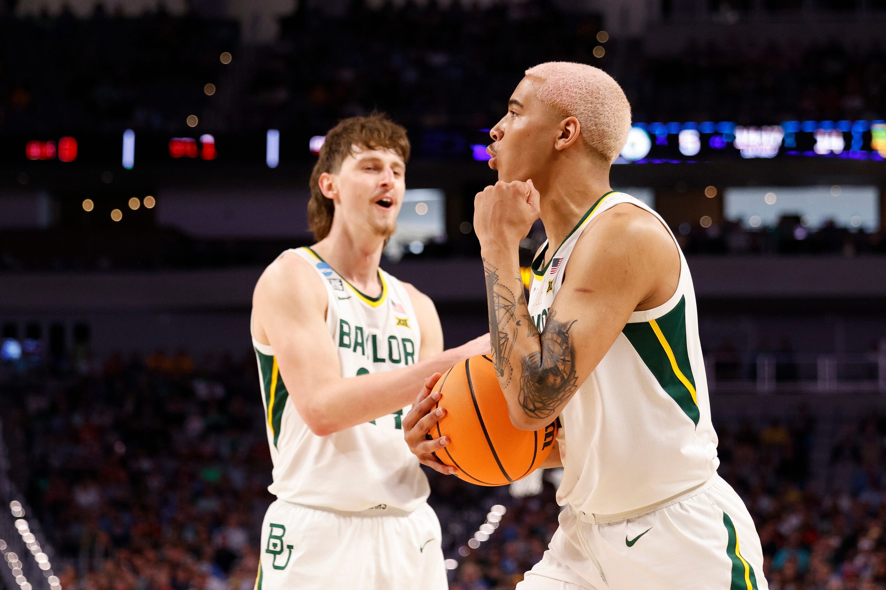 Baylor Bears forward Jeremy Sochan (1) reacts after a play during the first half in a first...