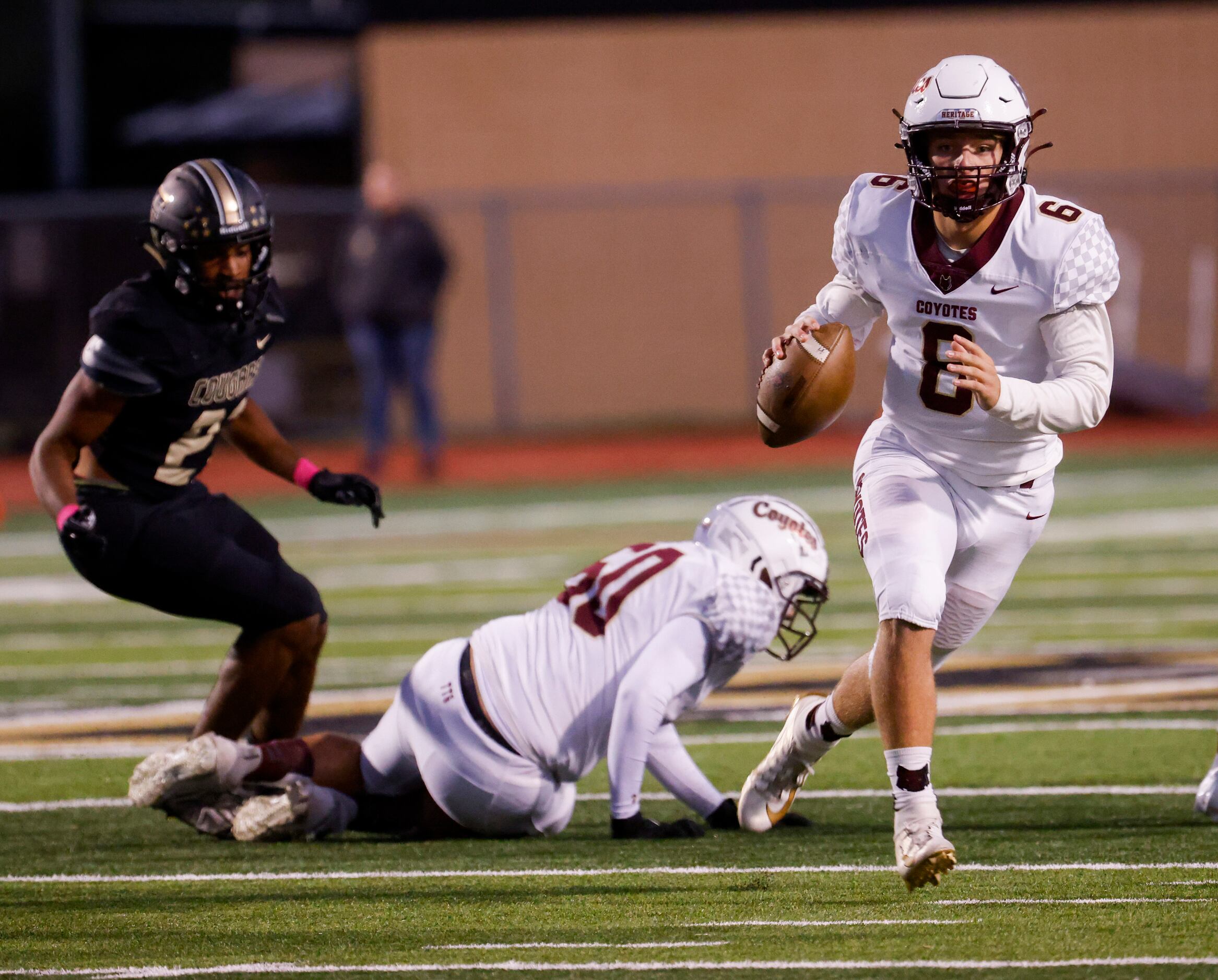 Frisco Heritage’s quarterback Easton Swetnam sets up for a pass during the first quarter of...
