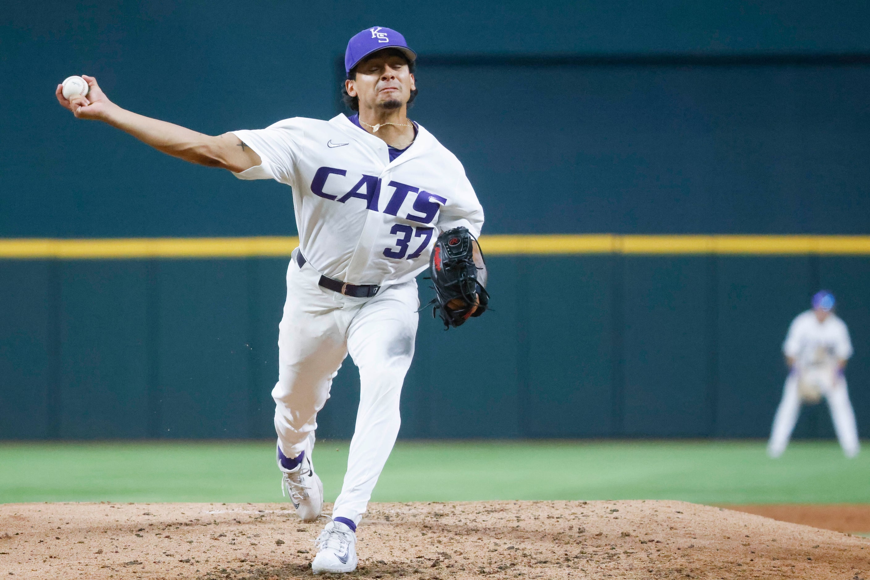 Kansas St. pitcher Logan Dobberstein throws during the fourth inning of a baseball game...