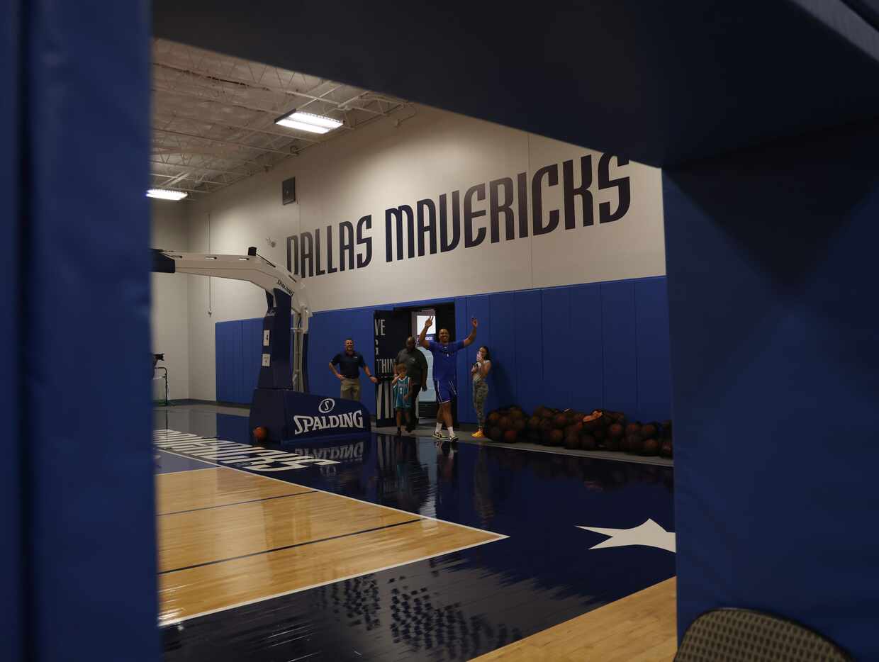 Dallas Mavericks player Grant Williams arrives at Hoops Camp to the cheers of youngsters...