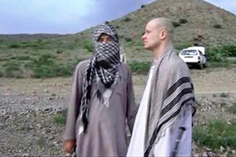
Sgt. Bowe Bergdahl stood with a Taliban fighter in eastern Afghanistan before his handover...
