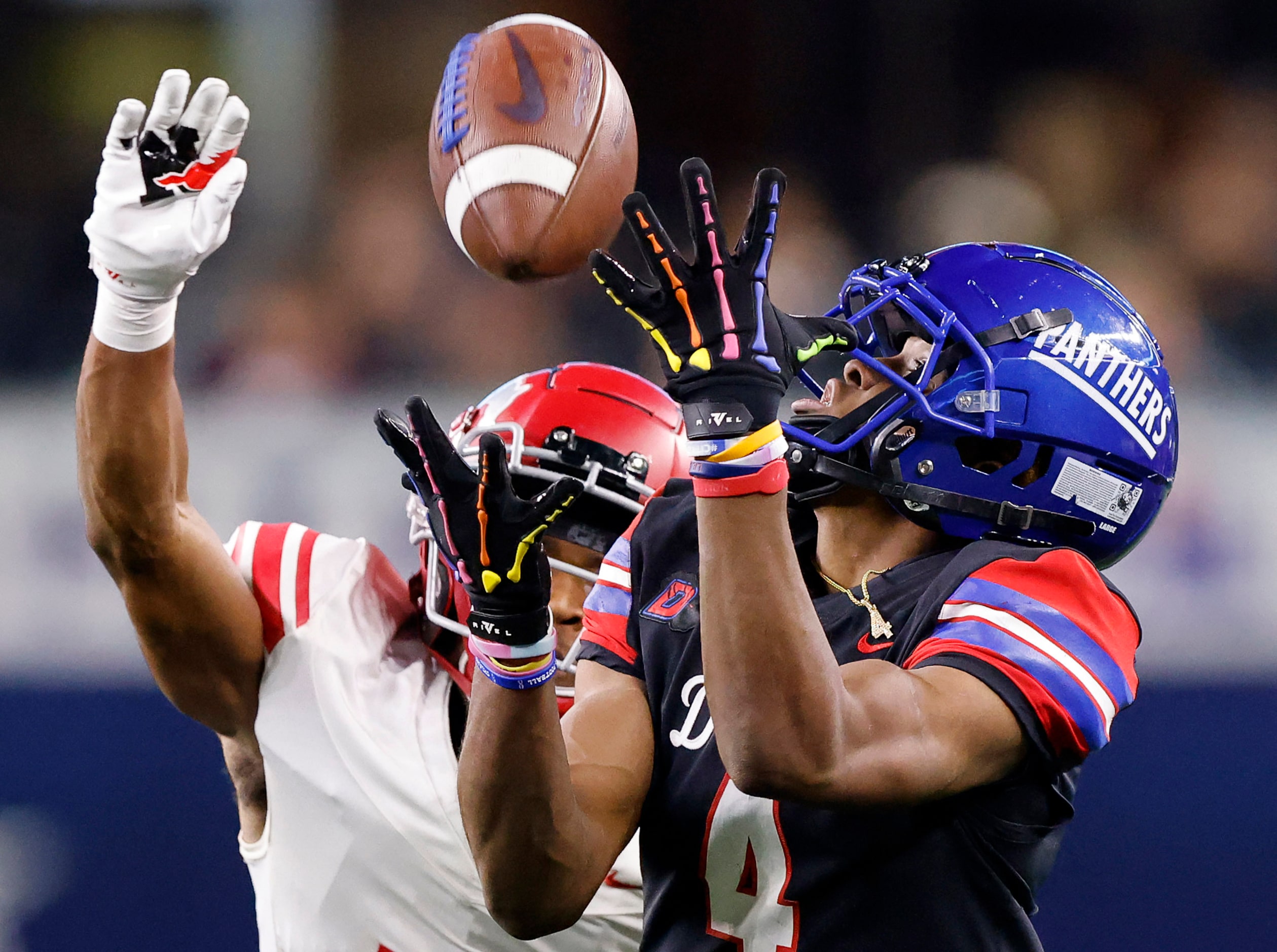 Duncanville wide receiver Dakorian Moore (4) hauls in a long first quarter pass in front of...