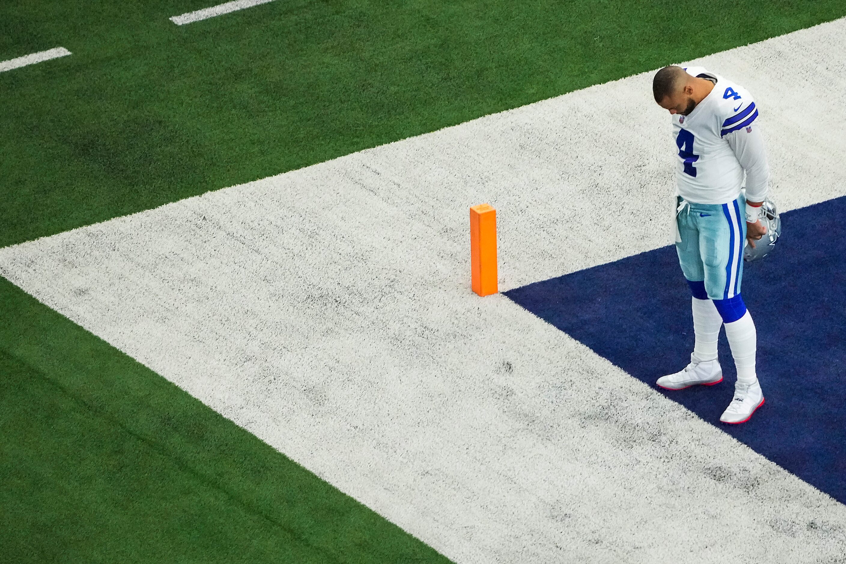 Dallas Cowboys quarterback Dak Prescott stands alone in the corner of the end zone before an...