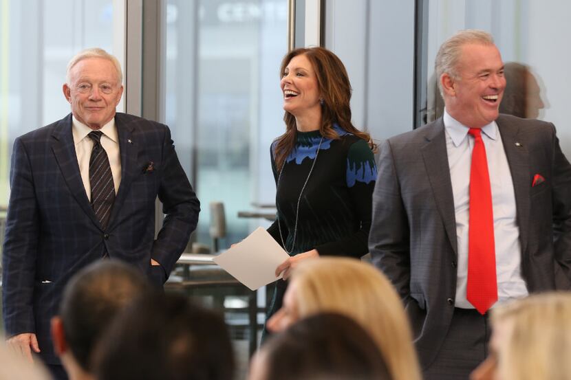 Jerry Jones, Charlotte Jones Anderson and Stephen Jones, left to right, share a laugh as...