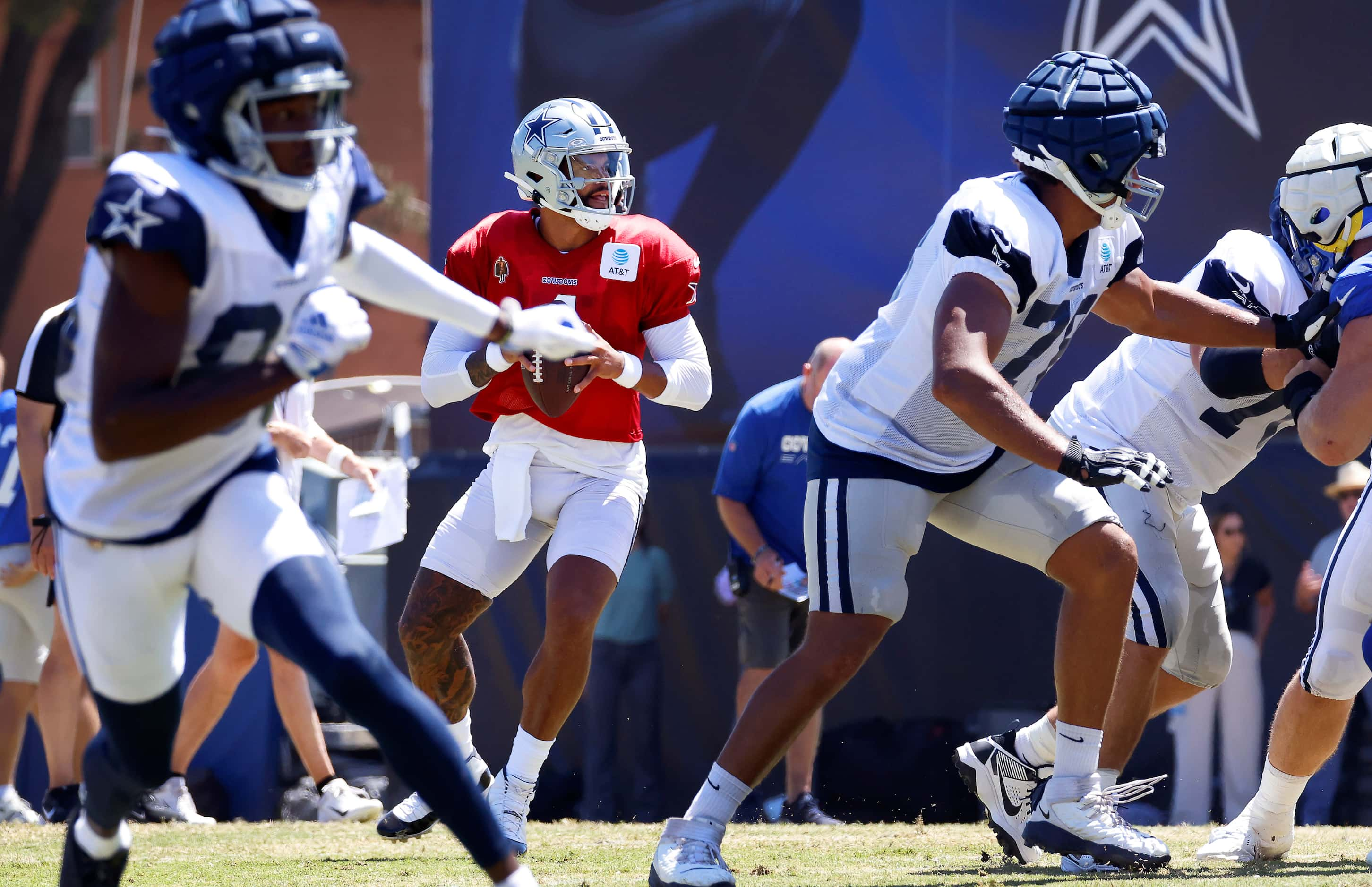 Dallas Cowboys quarterback Dak Prescott (4) drops back to pass against the Los Angeles Rams...