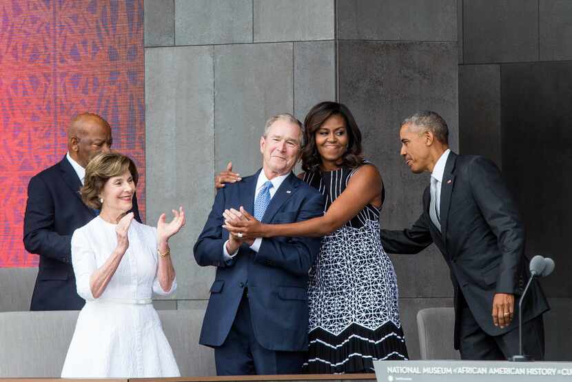 Former First Lady Laura Bush, former US President George W. Bush, First Lady Michelle Obama,...