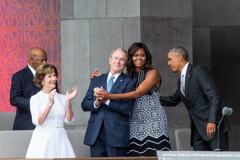 Former First Lady Laura Bush, former US President George W. Bush, First Lady Michelle Obama,...