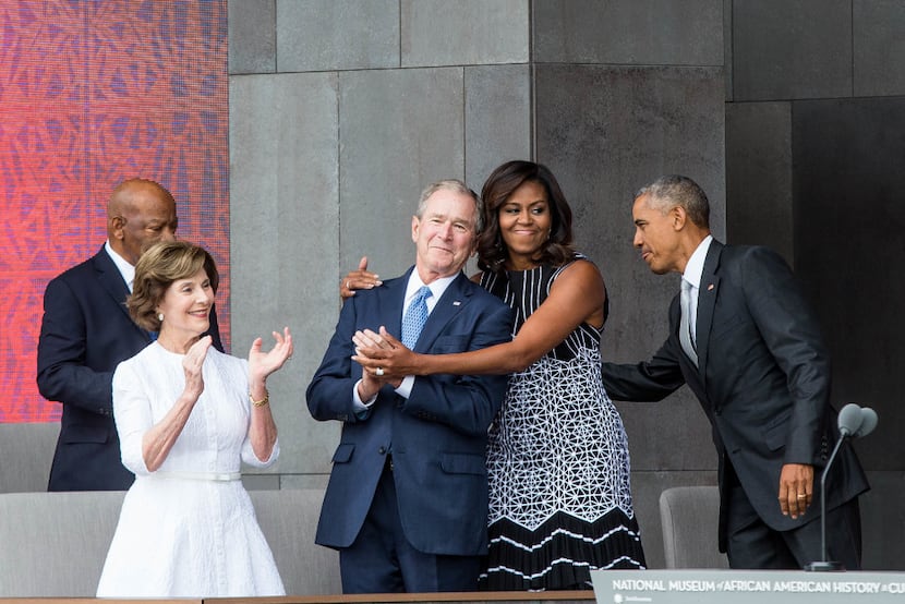 Former first lady Laura Bush, former President George W. Bush, first lady Michelle Obama and...