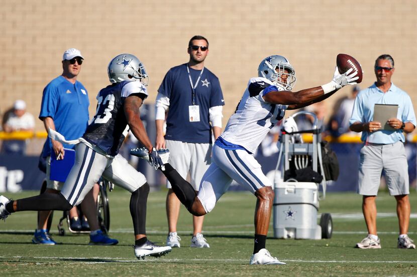 Dallas Cowboys wide receiver Brice Butler (19) catches the ball as Dallas Cowboys defensive...