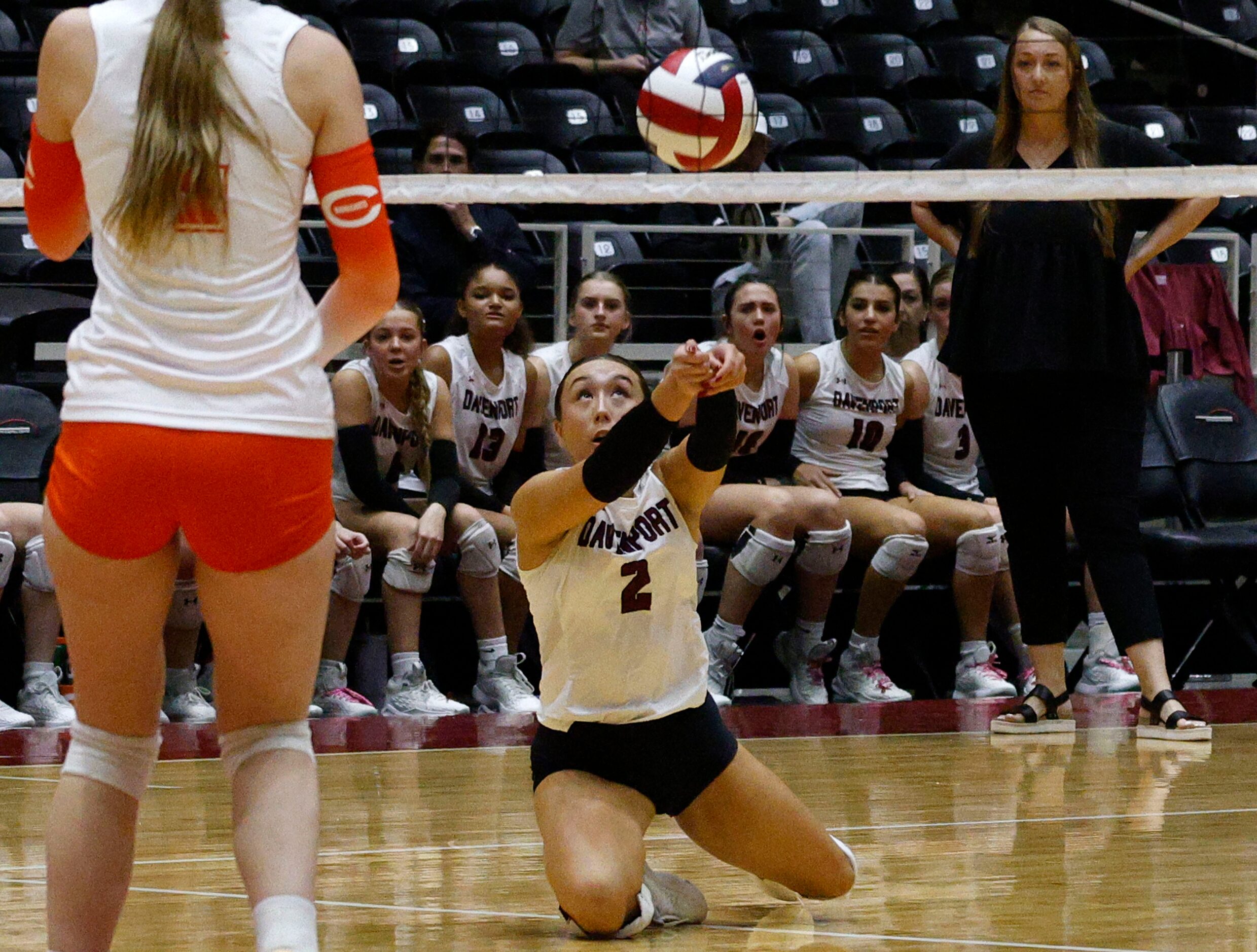 Comal Davenport's Emily Chabot (2) digs the ball against Celina in the second set during a...