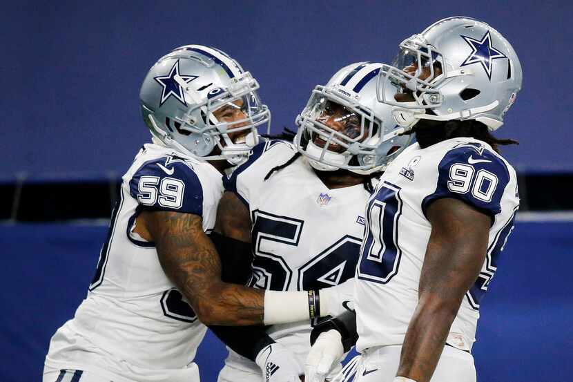 Dallas Cowboys middle linebacker Jaylon Smith (54) is congratulated on his third quarter...