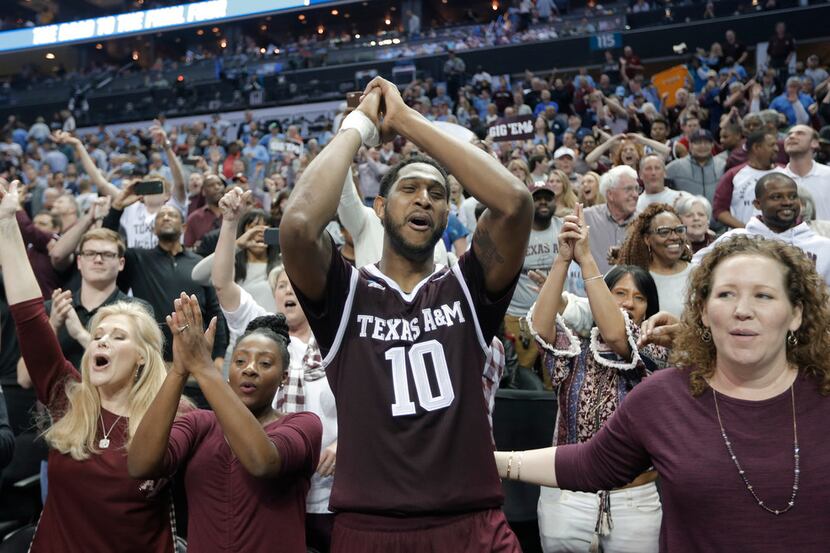 Texas A&M's Tonny Trocha-Morelos (10) celebrates with fans after a win over North Carolina...