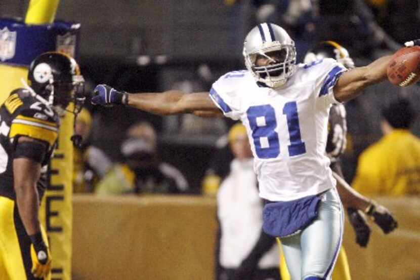 Dallas Cowboys Terrell Owens (81) celebrates after scoring a touchdown in a game against the...