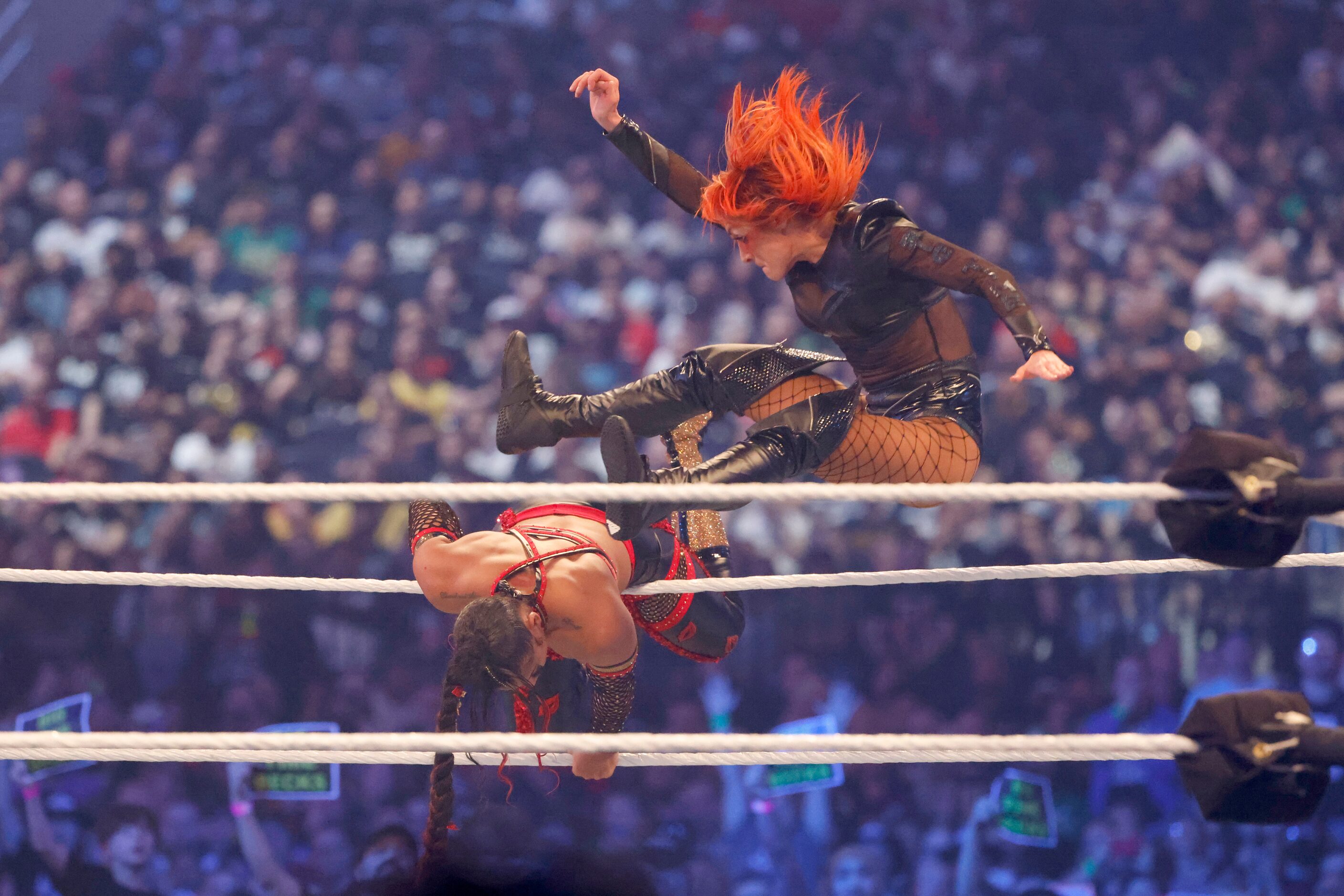 Becky Lynch, fight, leaps onto Bianca Belair as they fought for the Raw Women’s Championship...