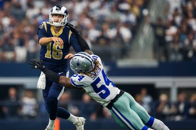 Dallas Cowboys outside linebacker Jaylon Smith (54) tackles Los Angeles Rams quarterback...
