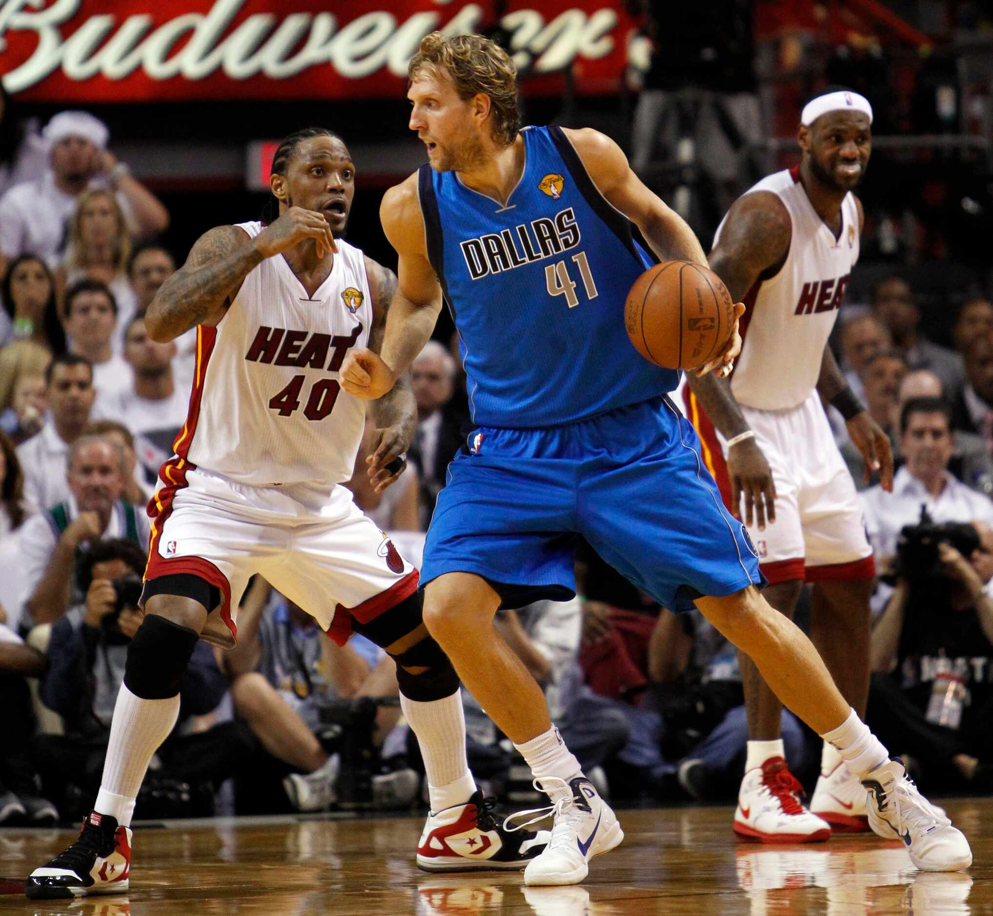 Dallas Mavericks power forward Dirk Nowitzki (41) drives on Miami Heat power forward Udonis...