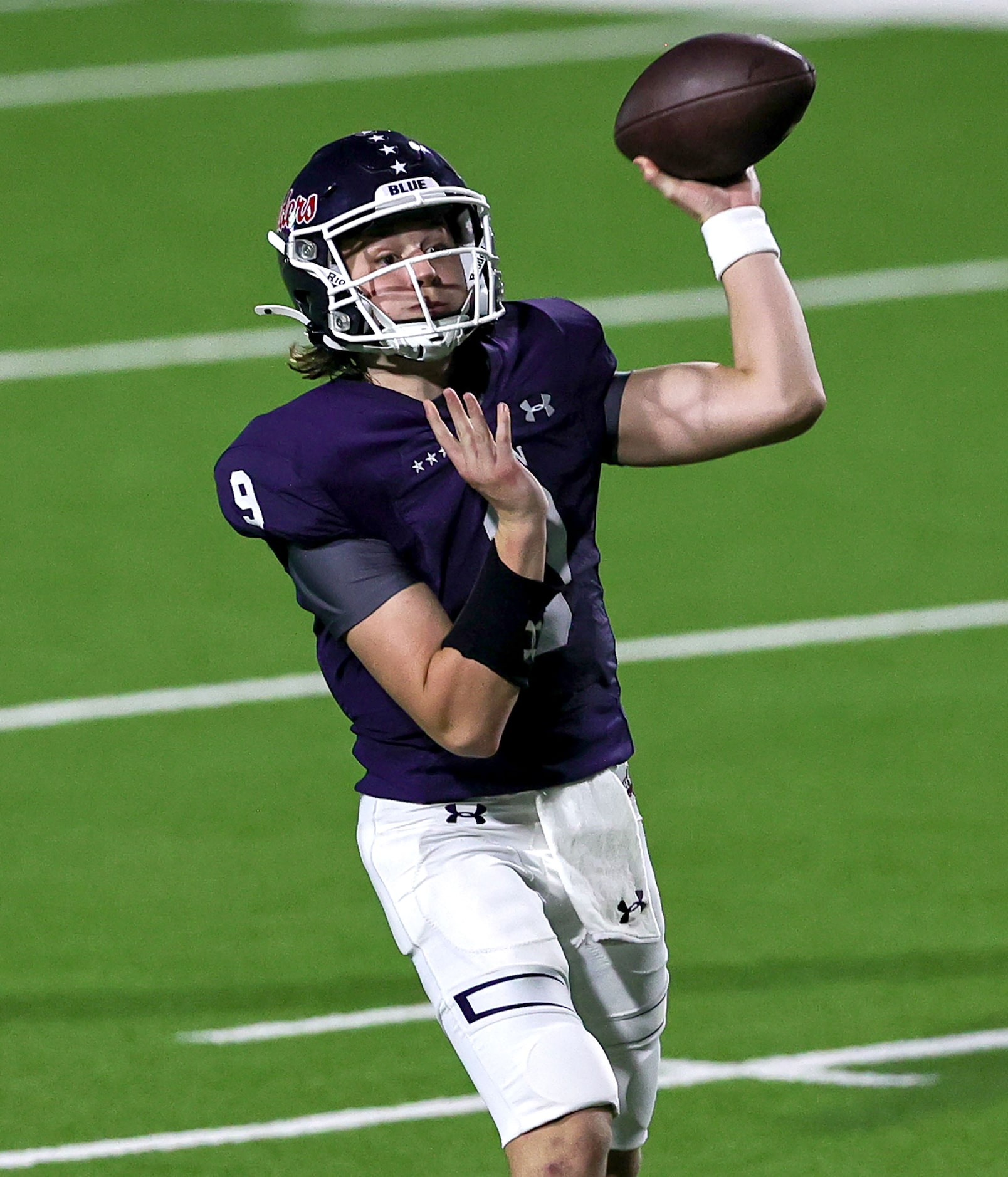 Denton Ryan quarterback Quin Henigan looks to pass against Mansfield Timberview during the...