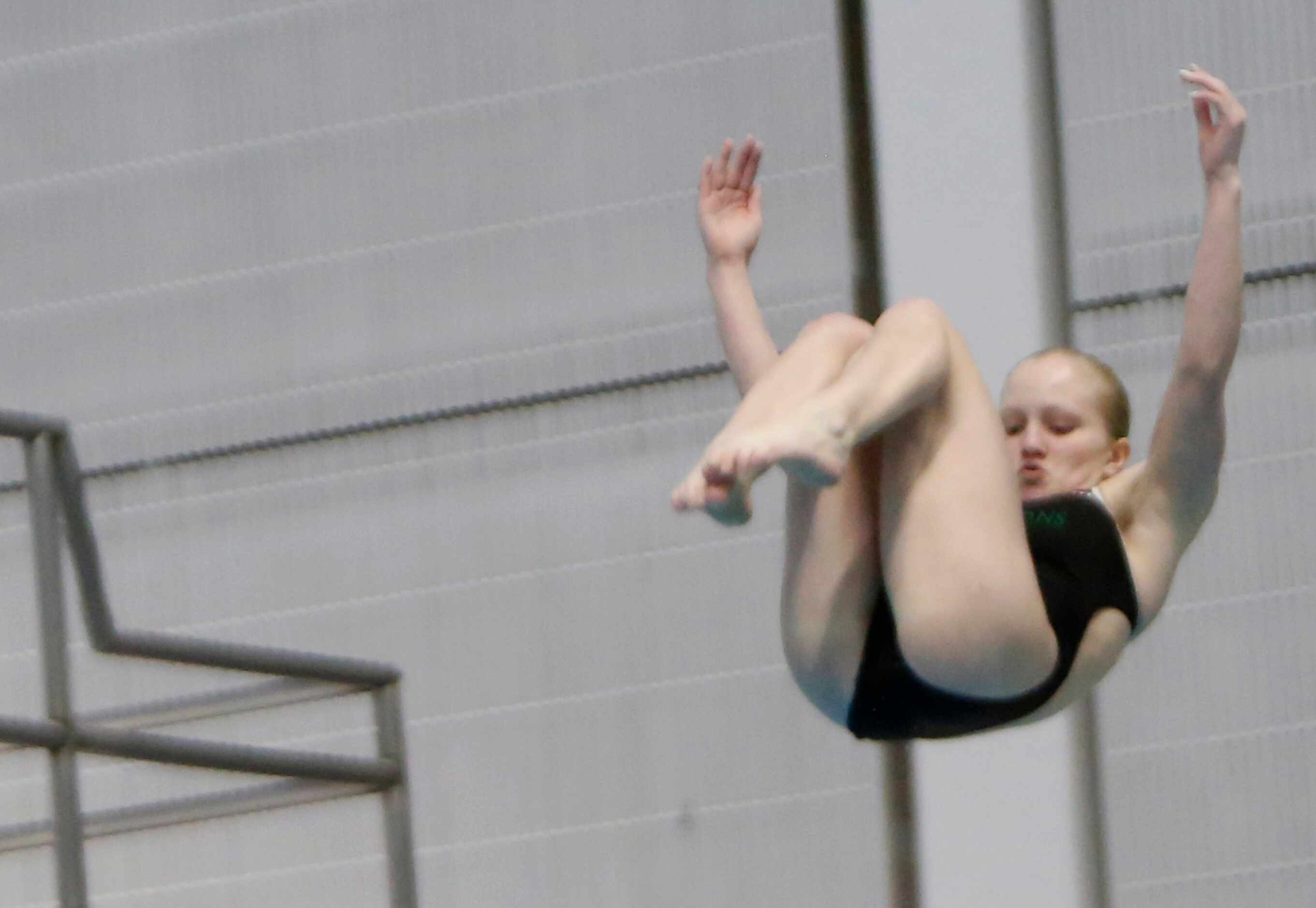 Southlake Carroll diver Natalie Stubbs completes a dude during 6A Girls competition. The...