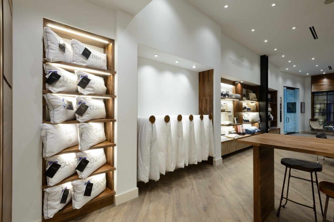 In addition to its luxury beds, the new Duxiana store on Knox Street offers linens and...