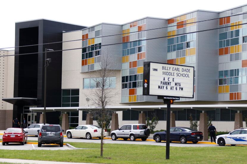  Dade Middle School was locked down Monday after a fight among a group of girls broke out on...