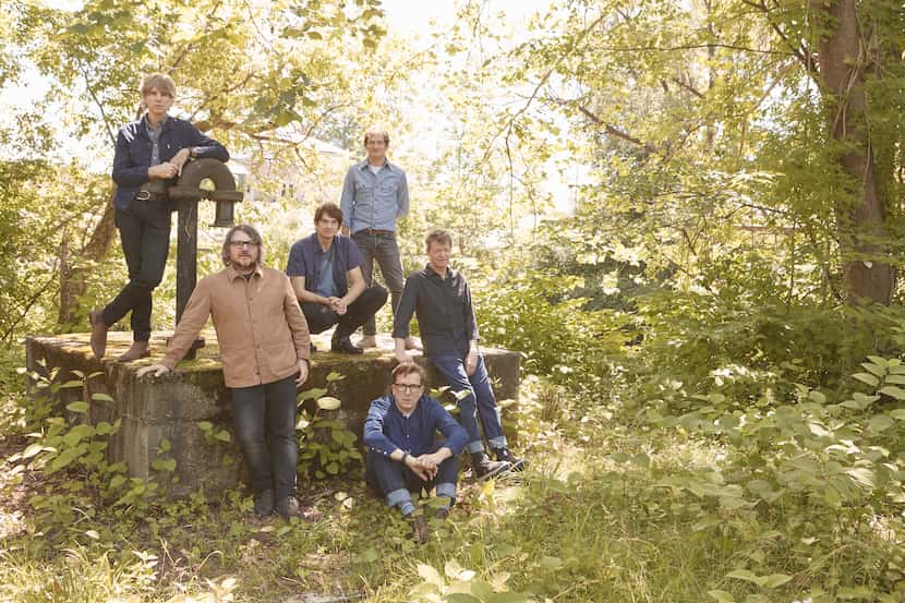 Jeff Tweedy, second from left, poses with members of the band Wilco.