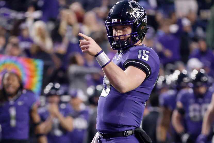 TCU Horned Frogs quarterback Max Duggan (15) points to wide receiver Savion Williams after...