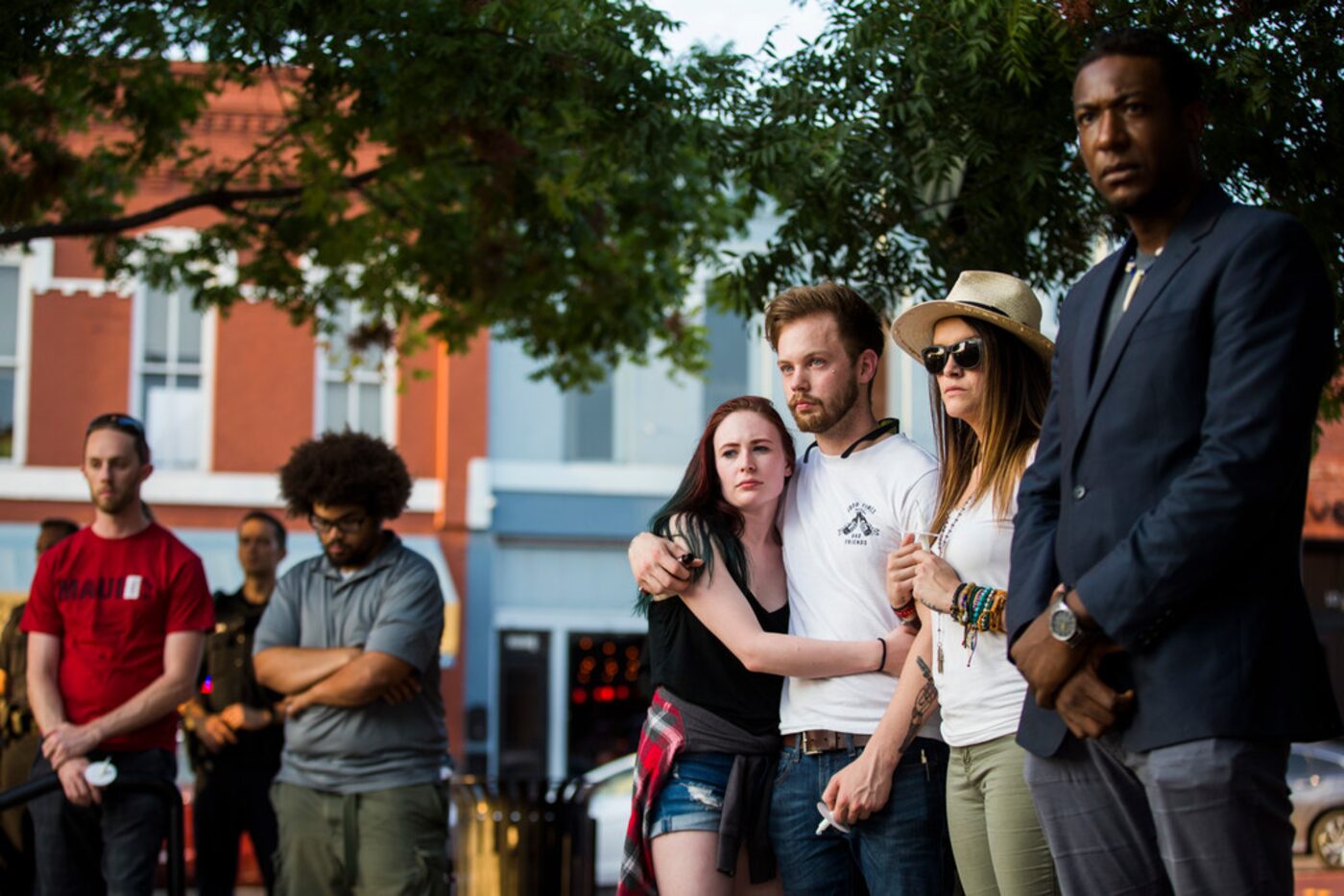 At a vigil Wednesday hosted by the Junior League of Collin County, people pay respects to...