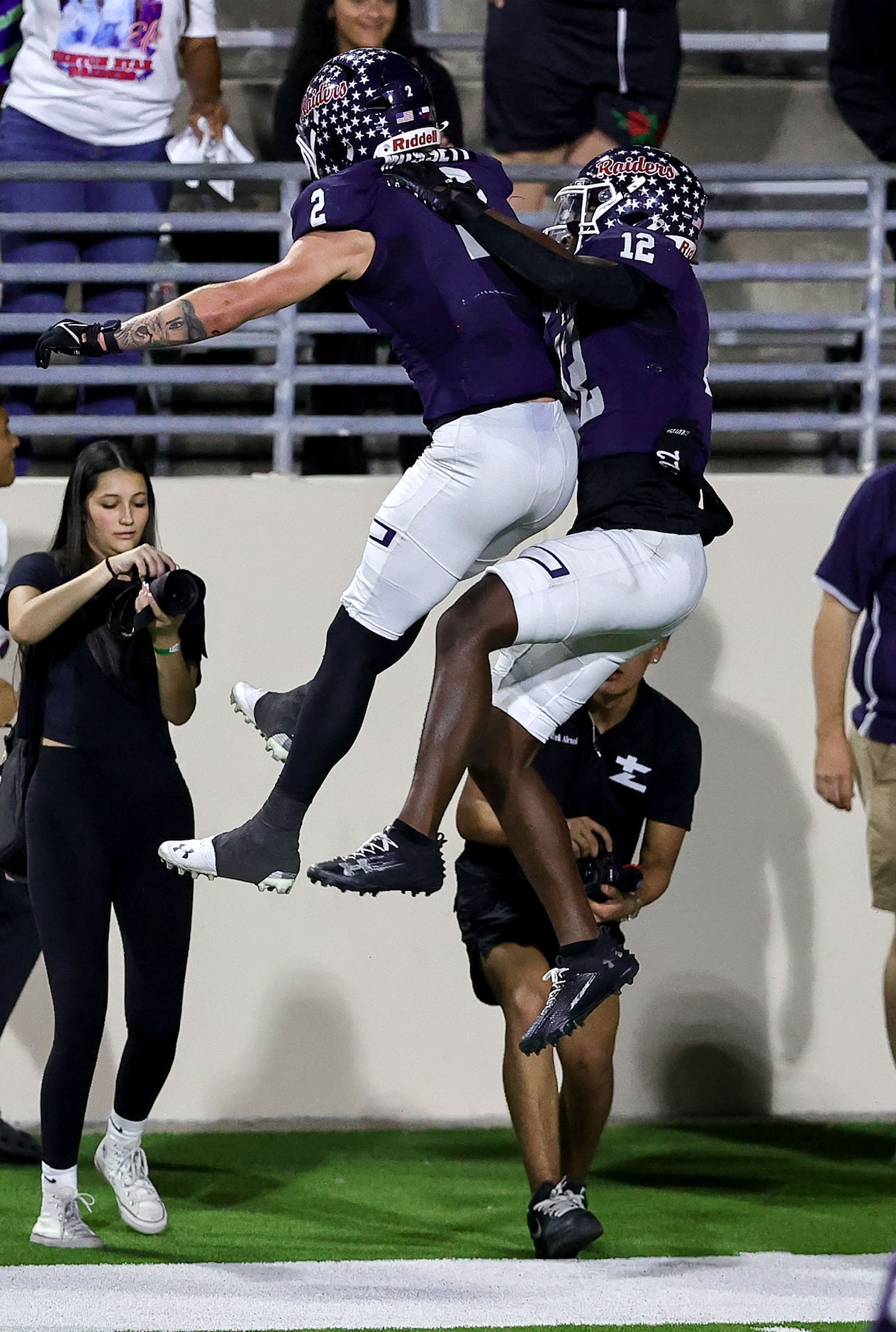 Denton Ryan defensive back Mun'terrius Ellis (12) and wide receiver Braeden Mussett (2)...