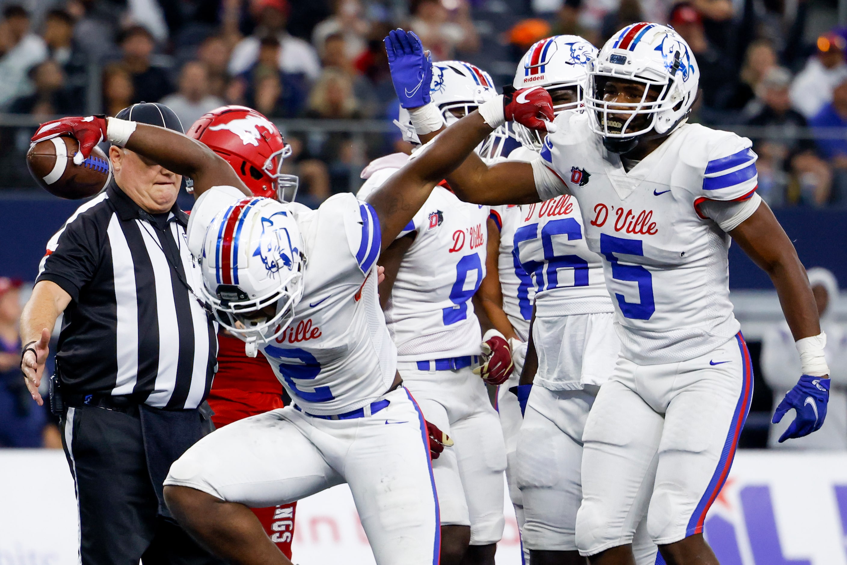 Duncanville linebacker Jordan Crook (2) celebrates his rushing touchdown with Duncanville...