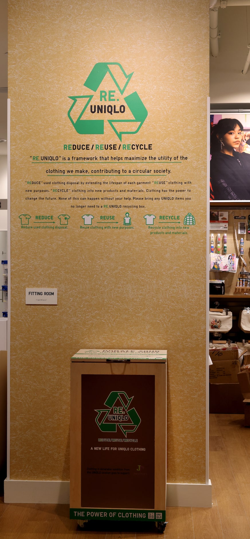 A display details the company's clothing recycle program at Uniqlo, a Japanese retailer,...