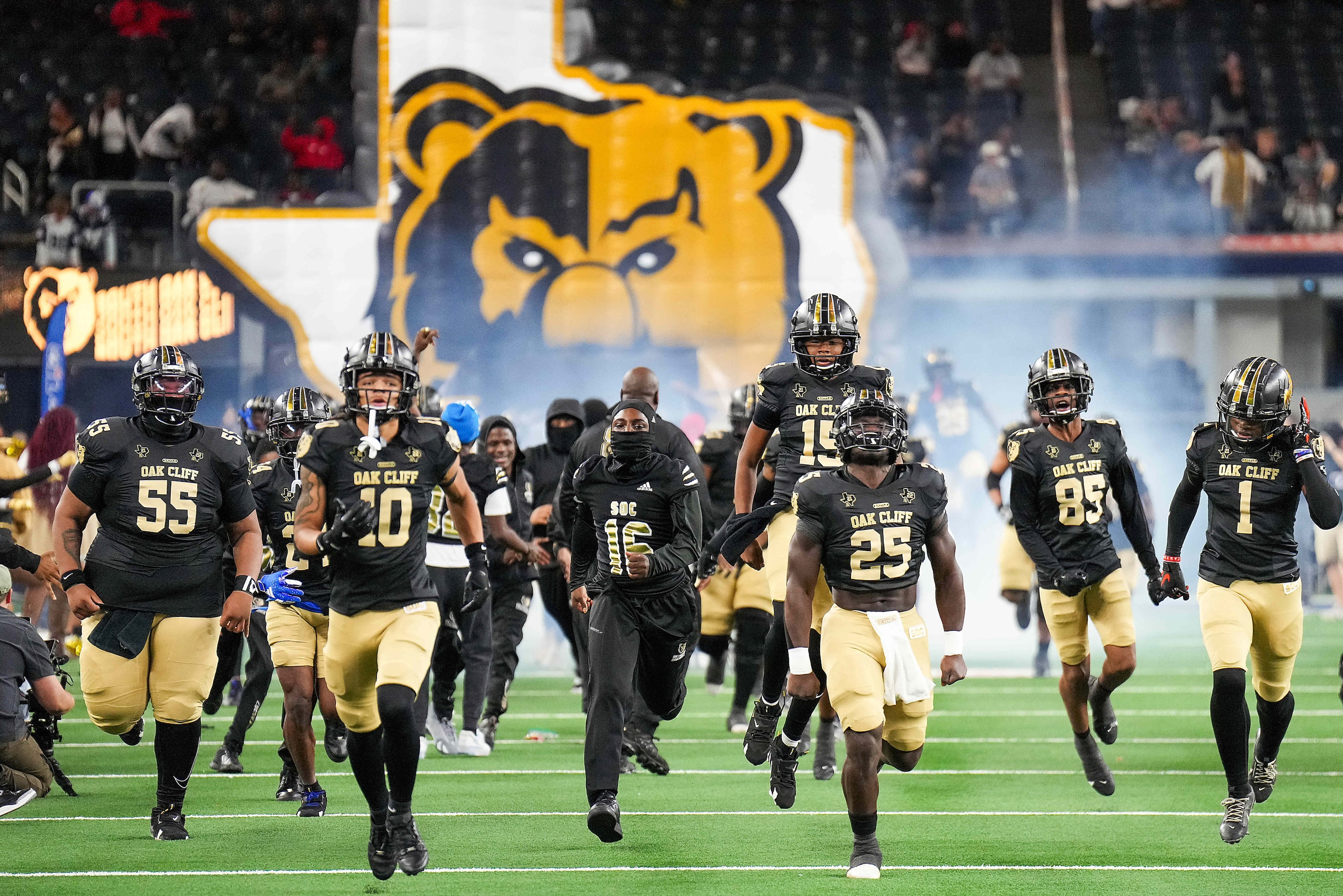 South Oak Cliff players take the field for the first half of the Class 5A Division II state...