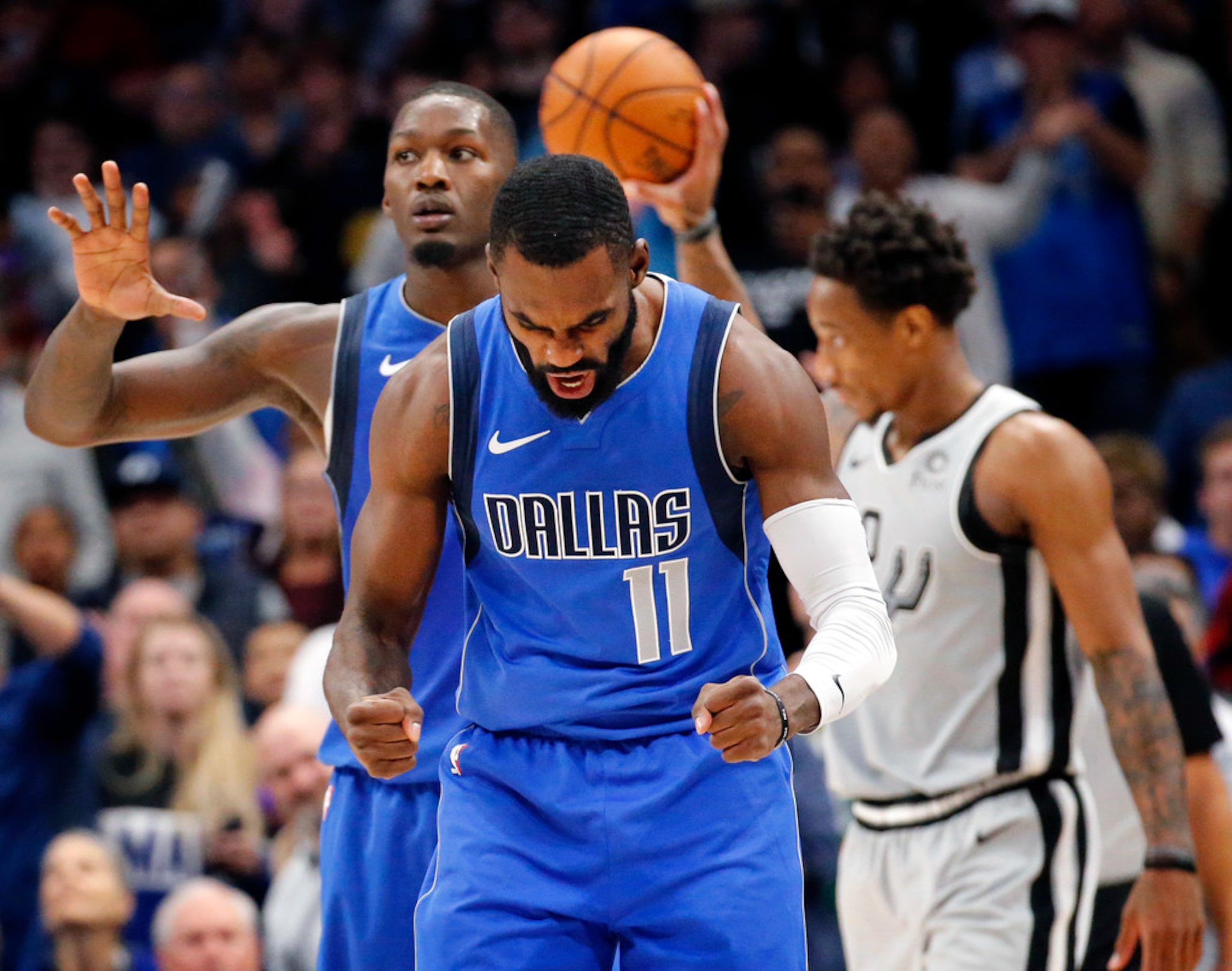 Dallas Mavericks guard Tim Hardaway Jr. (11) exhaults after keeping the San Antonio Spurs...