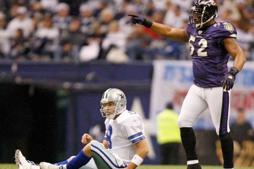 Ray Lewis gestures after sacking Tony Romo as the Baltimore Ravens play the Dallas Cowboys...