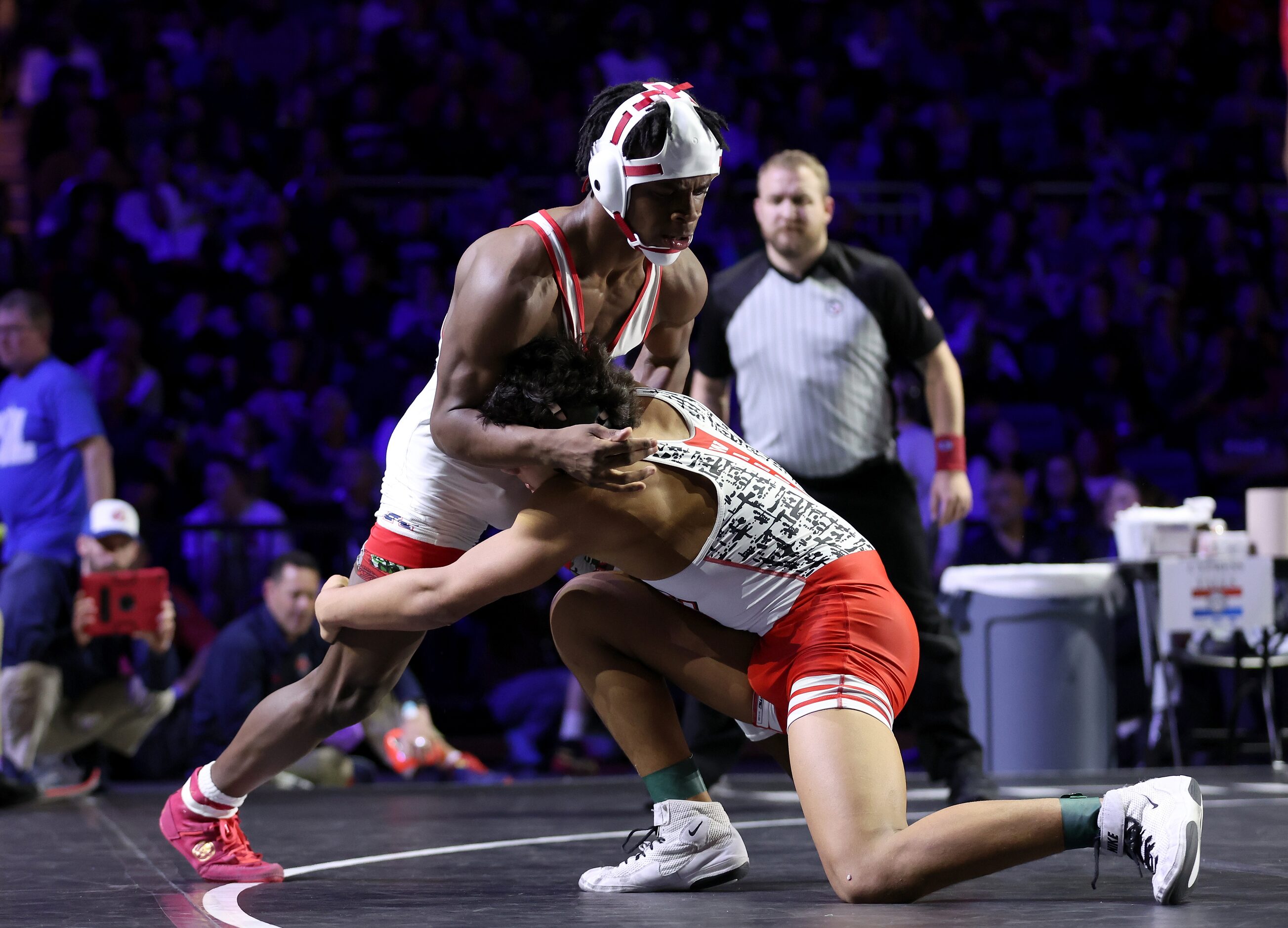 Javin Jackson-Bey (white) of Allen competes against Nicholas Zamora of Arlington Martin in...