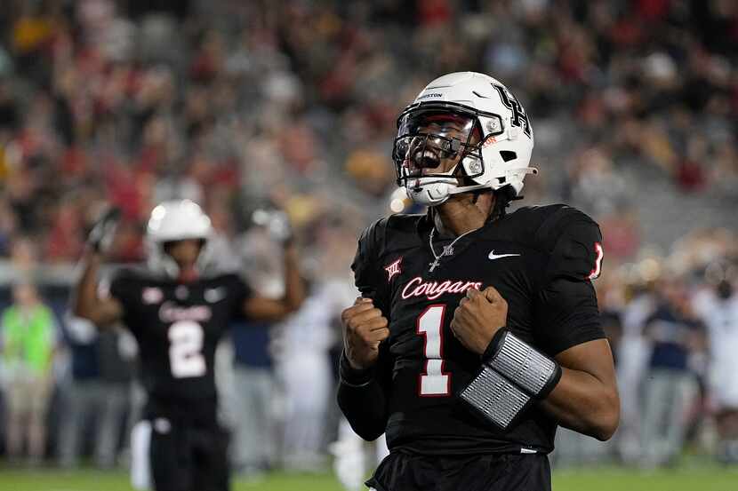 Houston quarterback Donovan Smith (1) celebrates after rushing for a touchdown against West...