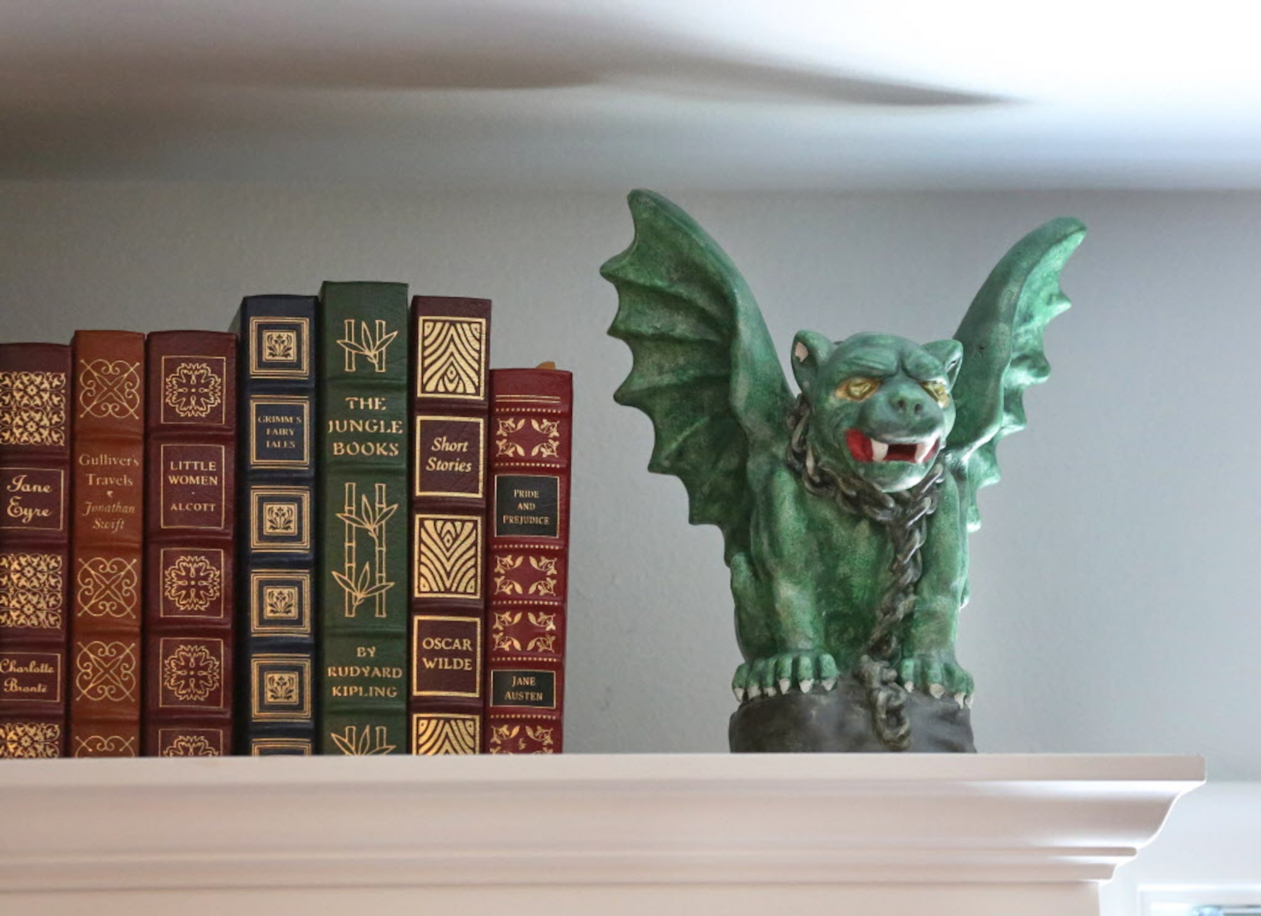 Gargoyles grace the bookshelf in the office of former Dallas Stars goalie Marty Turco,...