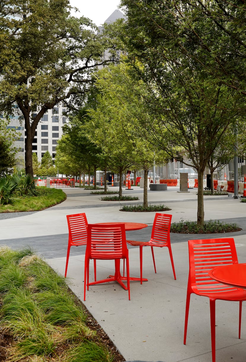 The Harwood Promenade, a tree-lined area along Harwood Street. Surrounded by high-rise...