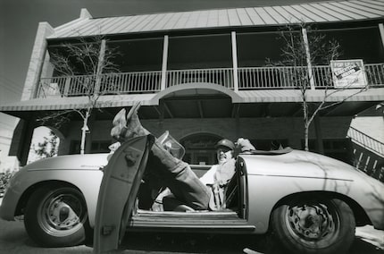 Tom Garrison, pictured here in 1988 in front of his Stoneleigh P bar in Dallas, is now 82...