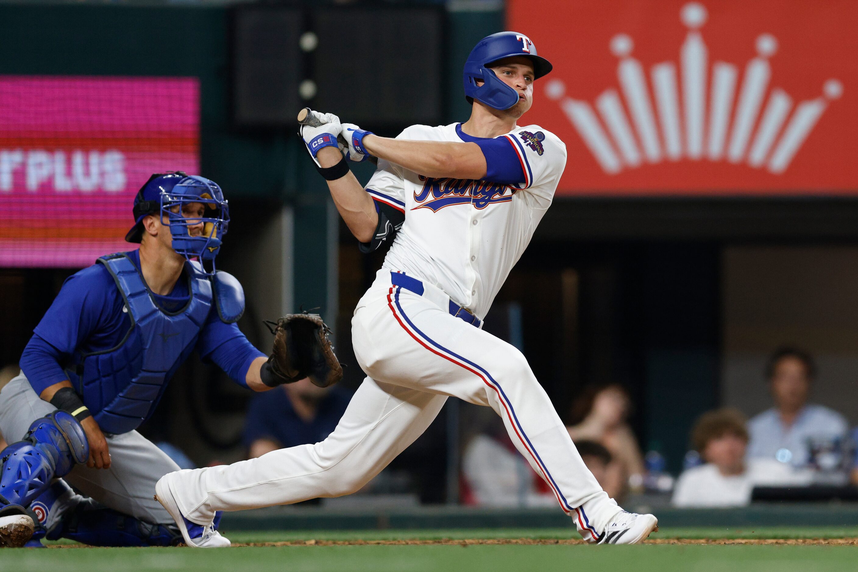 Texas Rangers shortstop Corey Seager (5) singles to right field during the eighth inning of...