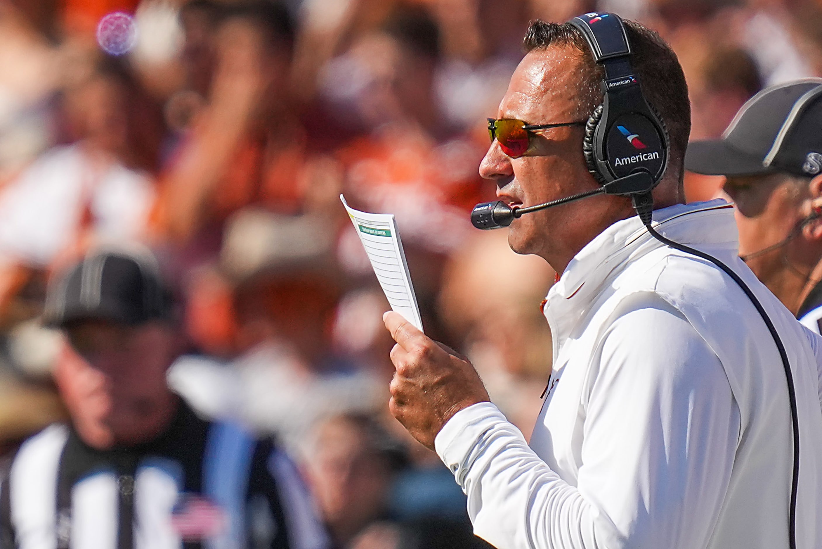 Texas head coach Steve Sarkisian works on the sidelines during the first half of an NCAA...