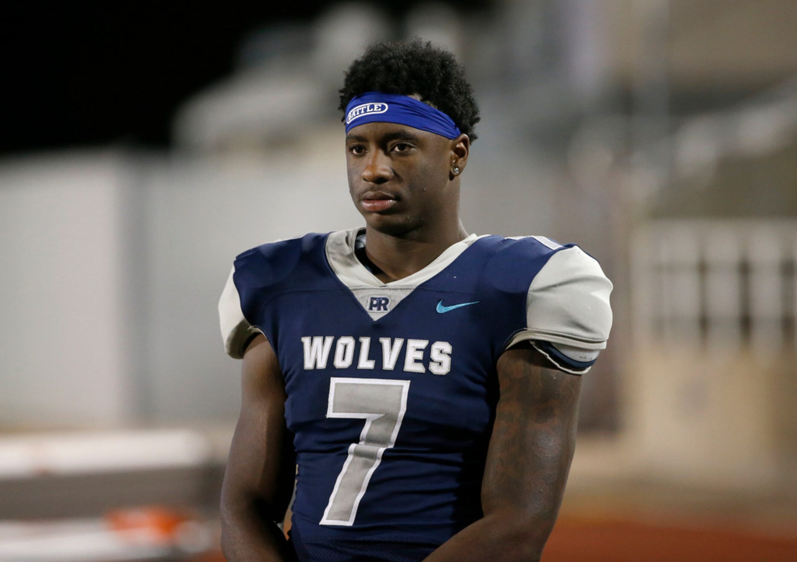 Carrollton Ranchview's Michael Henderson (7) watches from th sideline during the second half...