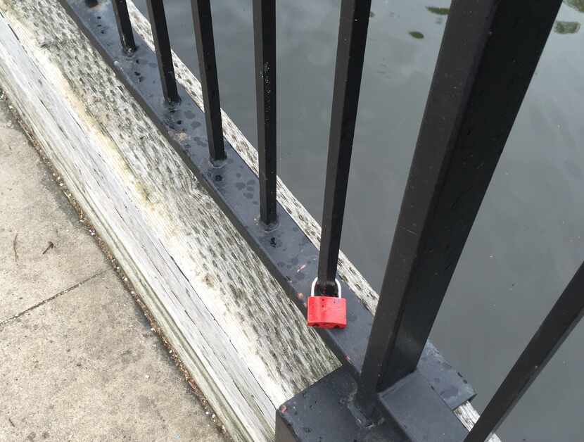  A padlock sits on bridge at Cottonwood Park in Richardson. (Photo by Rebekah Meuir)