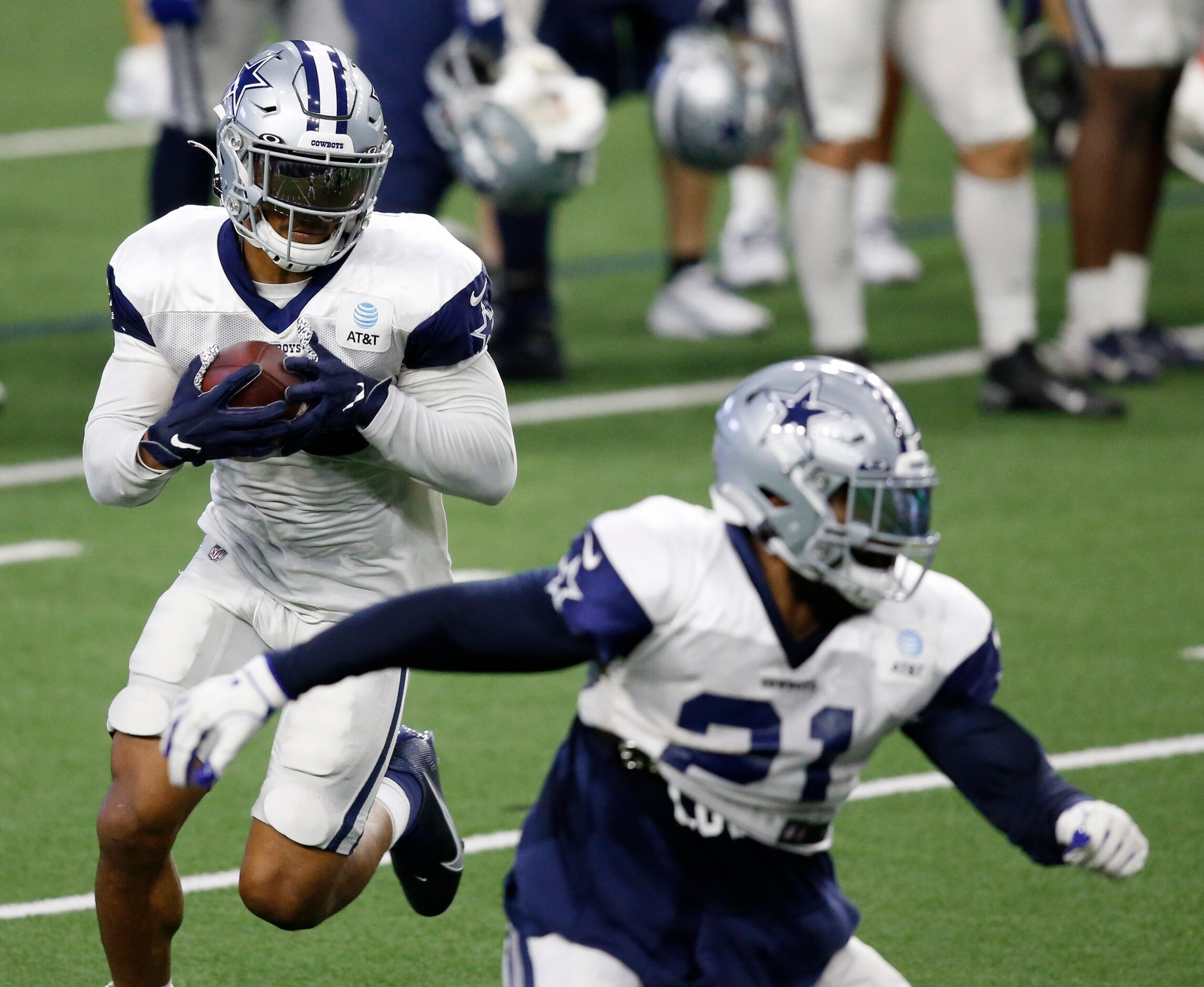 Dallas Cowboys running back Tony Pollard (20) rushes up the field as Dallas Cowboys running...