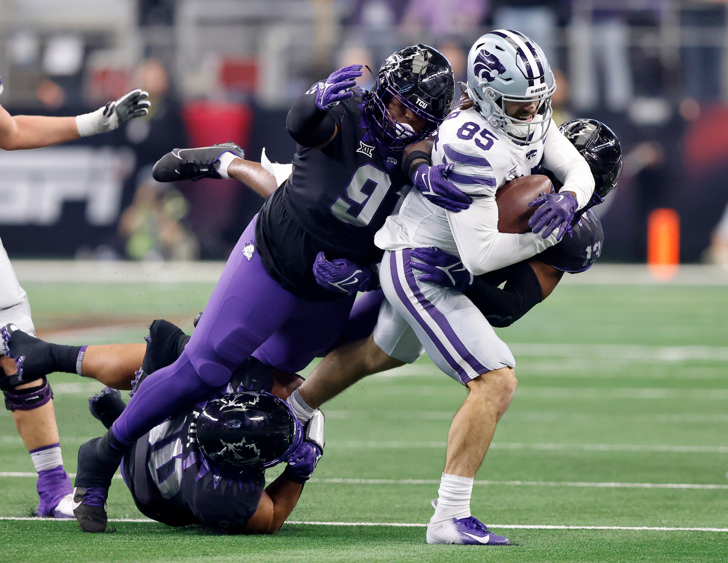 TCU Horned Frogs defensive lineman Caleb Fox (90), defensive lineman Tymon Mitchell (91) and...