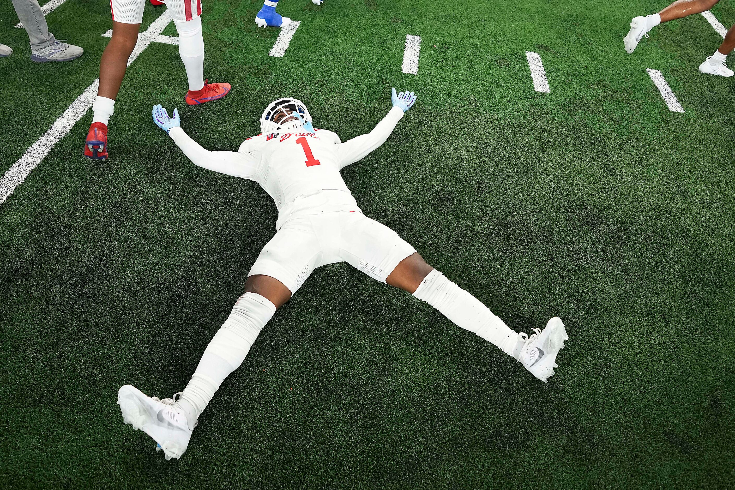 Duncanville’s Dakorien Moore (1) celebrates after a victory over Galena Park North Shore in...