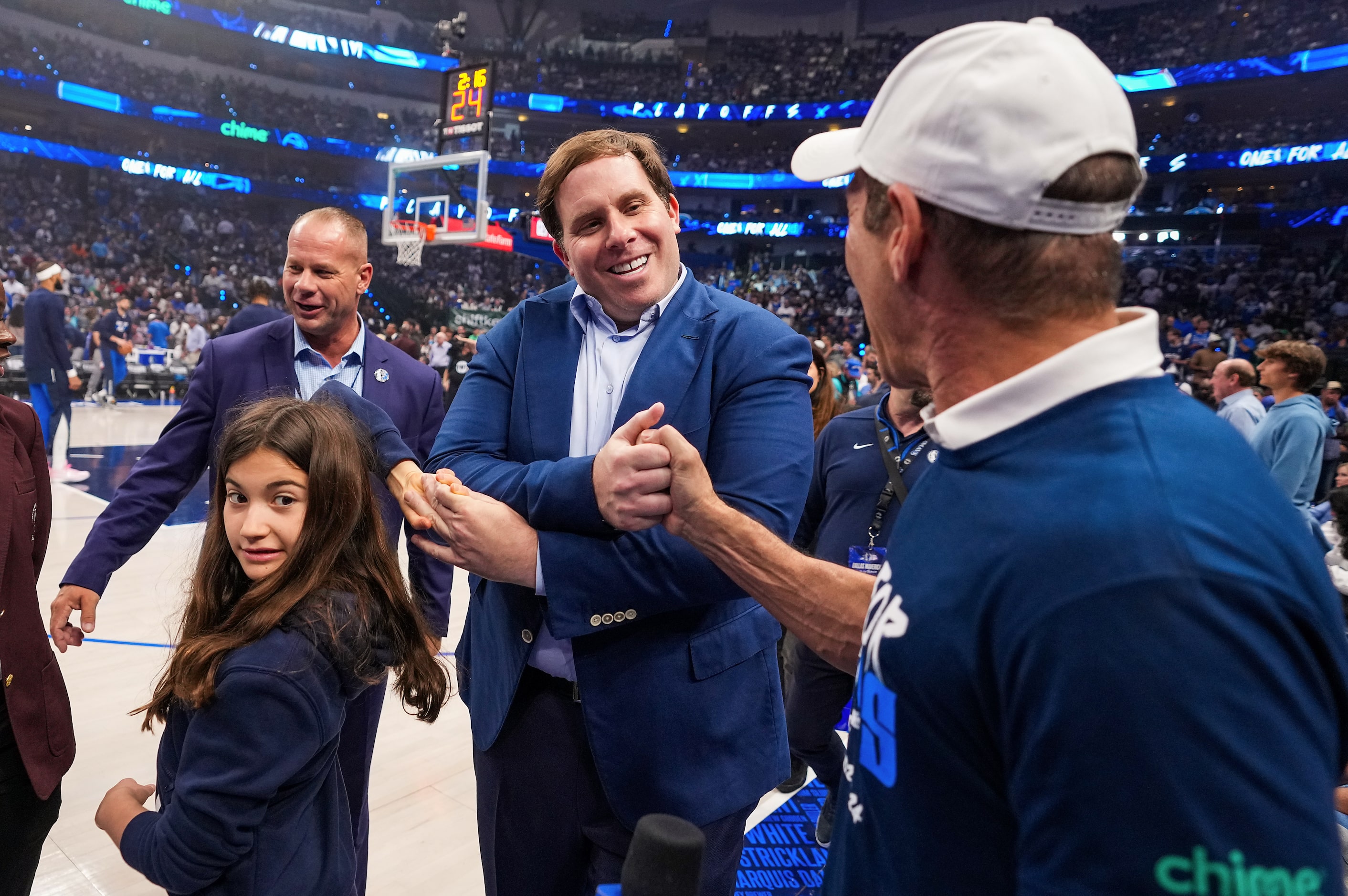 Dallas Mavericks governor Patrick Dumont heads to his seat before Game 4 of the NBA...